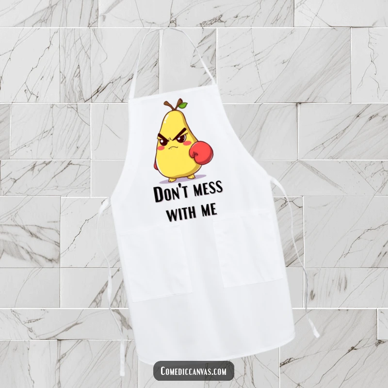 Funny grumpy pear wearing a tiny boxing glove and glaring, a fun apron for kitchen battles.
