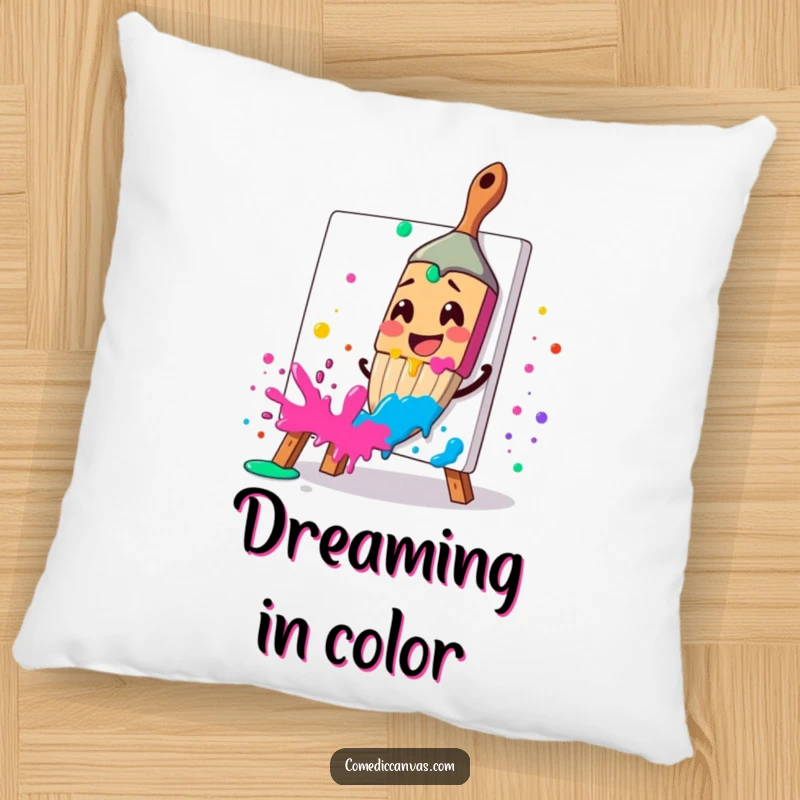 Funny pillow featuring a smiling paintbrush splattering paint, offering artistic comfort, a funny gift.