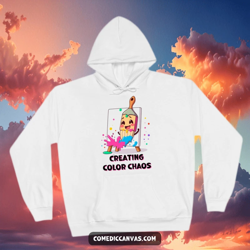 Funny hoodie featuring a smiling paintbrush excitedly splattering vibrant paint, ideal for artistic comfort, a funny gift.