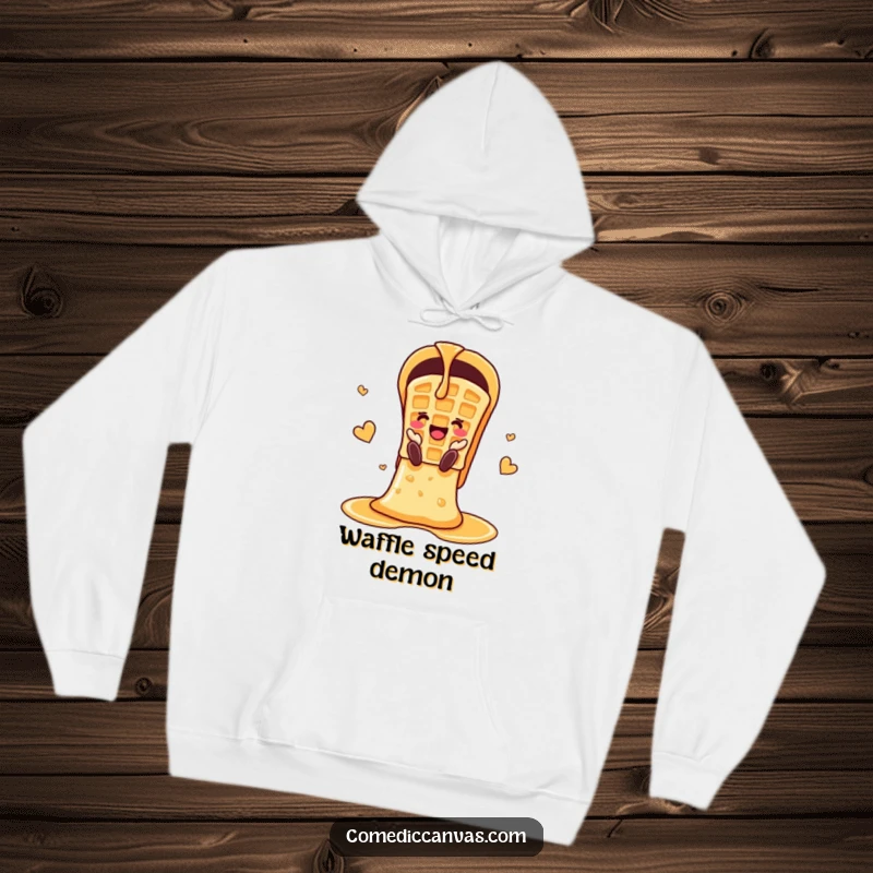 A cheerful waffle slides down a chute made of syrup, printed on a cozy and fun hoodie.