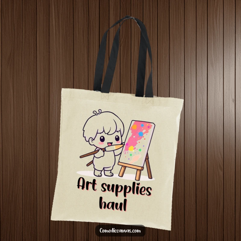Funny tote bag featuring a Kawaii character painting a vibrant picture with a comically large brush.